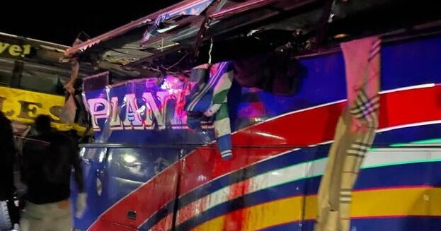 At least 63 killed as 2 buses hit head-on in multi-vehicle crash in Uganda, police say