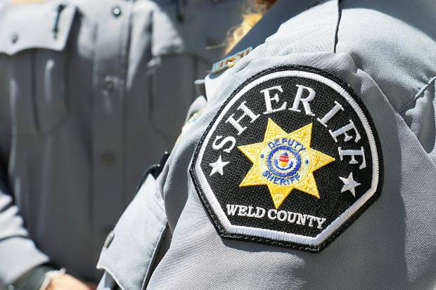 Semitrailer hits Weld County sheriff's vehicle on side of I-25, injuring deputy