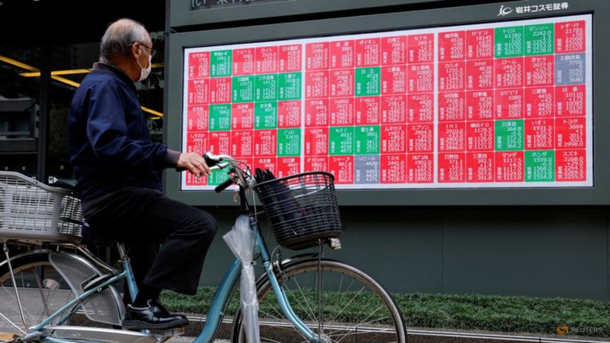 Asia stocks tumble from record highs on profit taking; dollar gains