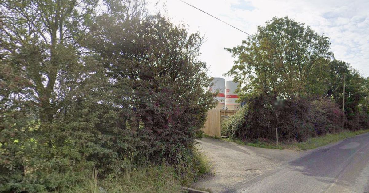 Car smashes into gas substation as fire crews rush to evacuate homes