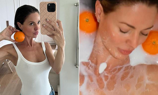 Dina Broadhurst covers herself in milk while completely nude
