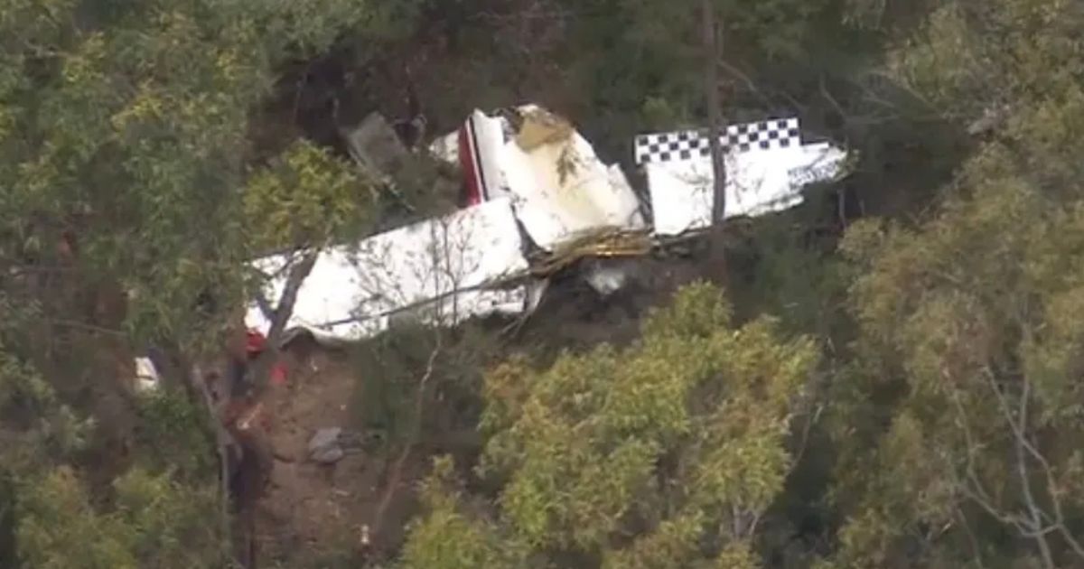 Two planes in fatal mid-air collision as police seal off 'crime scenes'