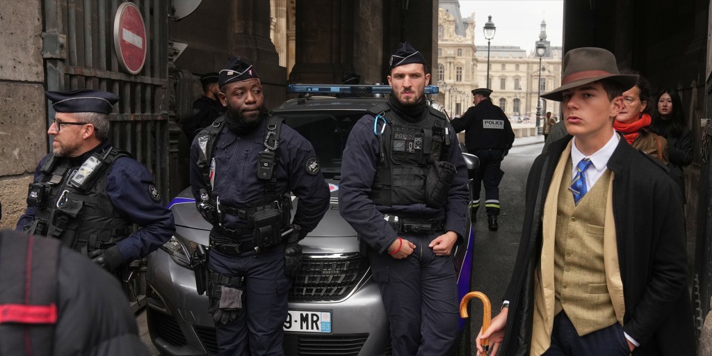Fedora man unmasked: Meet the teen behind the Louvre mystery photo