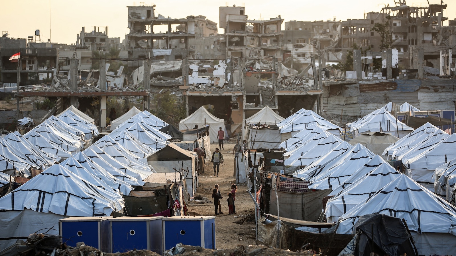 As weather turns wintry in Gaza, residents worry about shelter, food and flooding