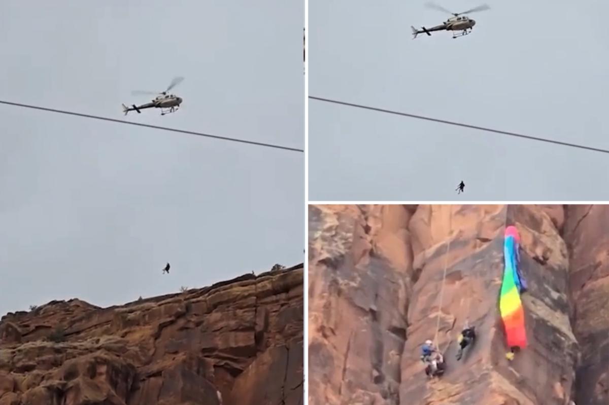 Video shows daring helicopter rescue of BASE jumper dangling from...
