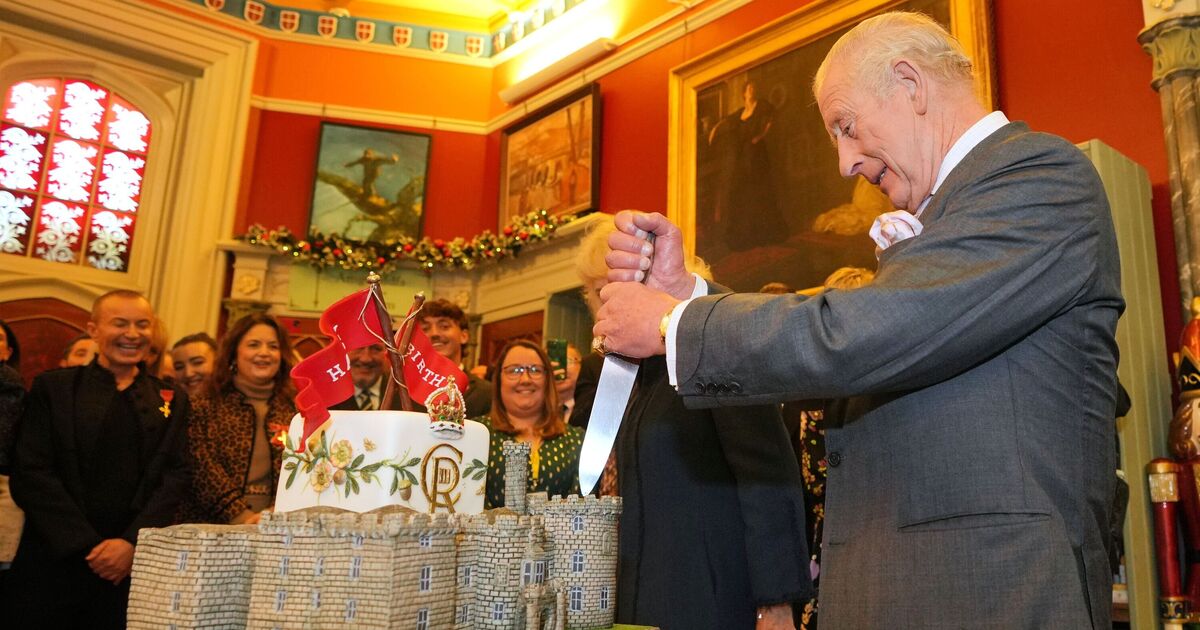 King Charles serenaded on his birthday as he cuts incredible castle cake