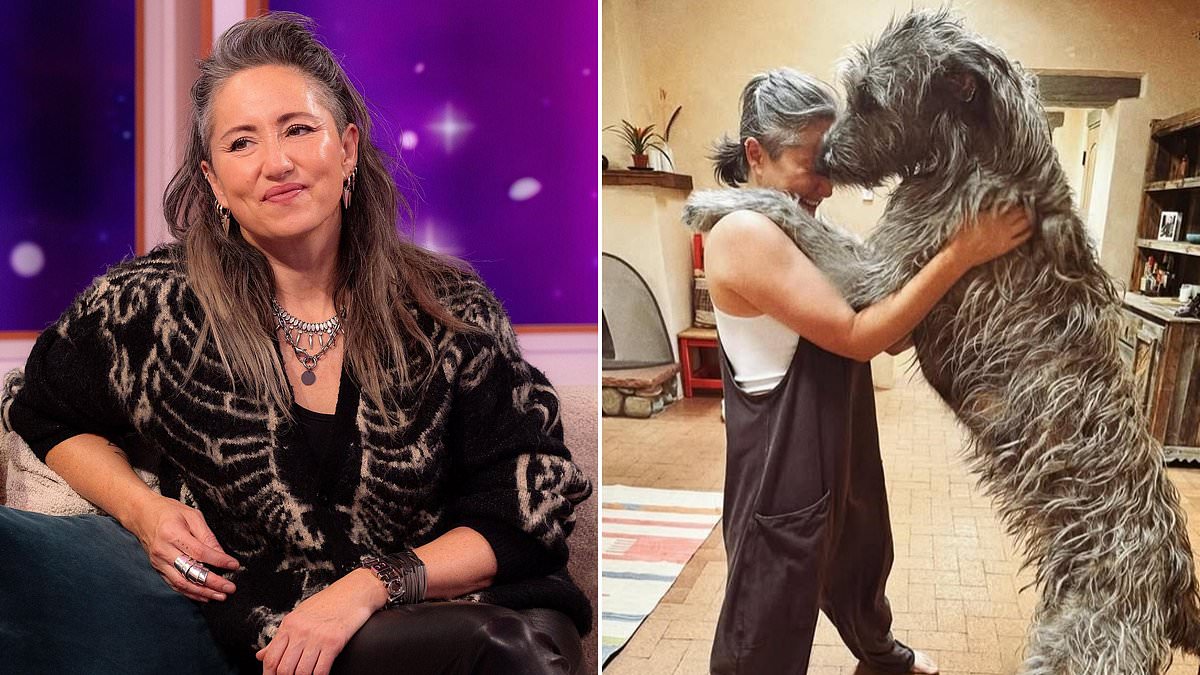 KT Tunstall is dwarfed by her massive Irish wolfhound