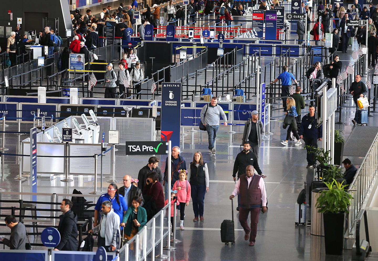 'I just want to get home.' Flyers at Logan Airport experience delays, cancellations, brace for more disruptions - The Boston Globe