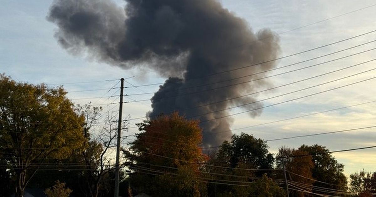 Horror plane crash with plumes of smoke seen for miles as cops swarm scene