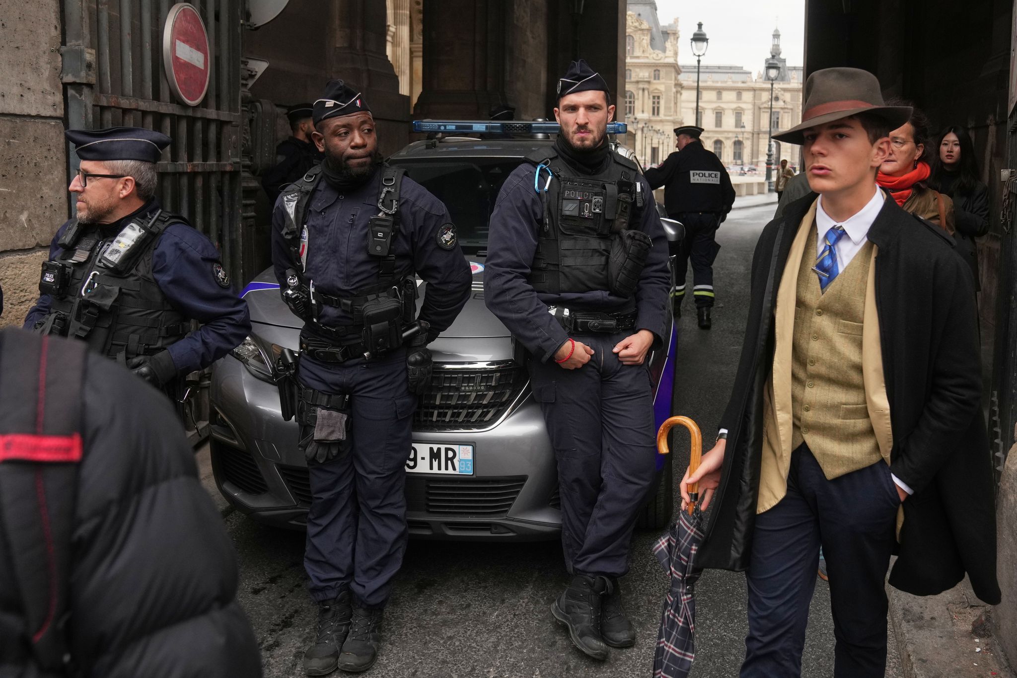 Teen behind the Louvre heist 'Fedora Man' photo embraces his mystery moment