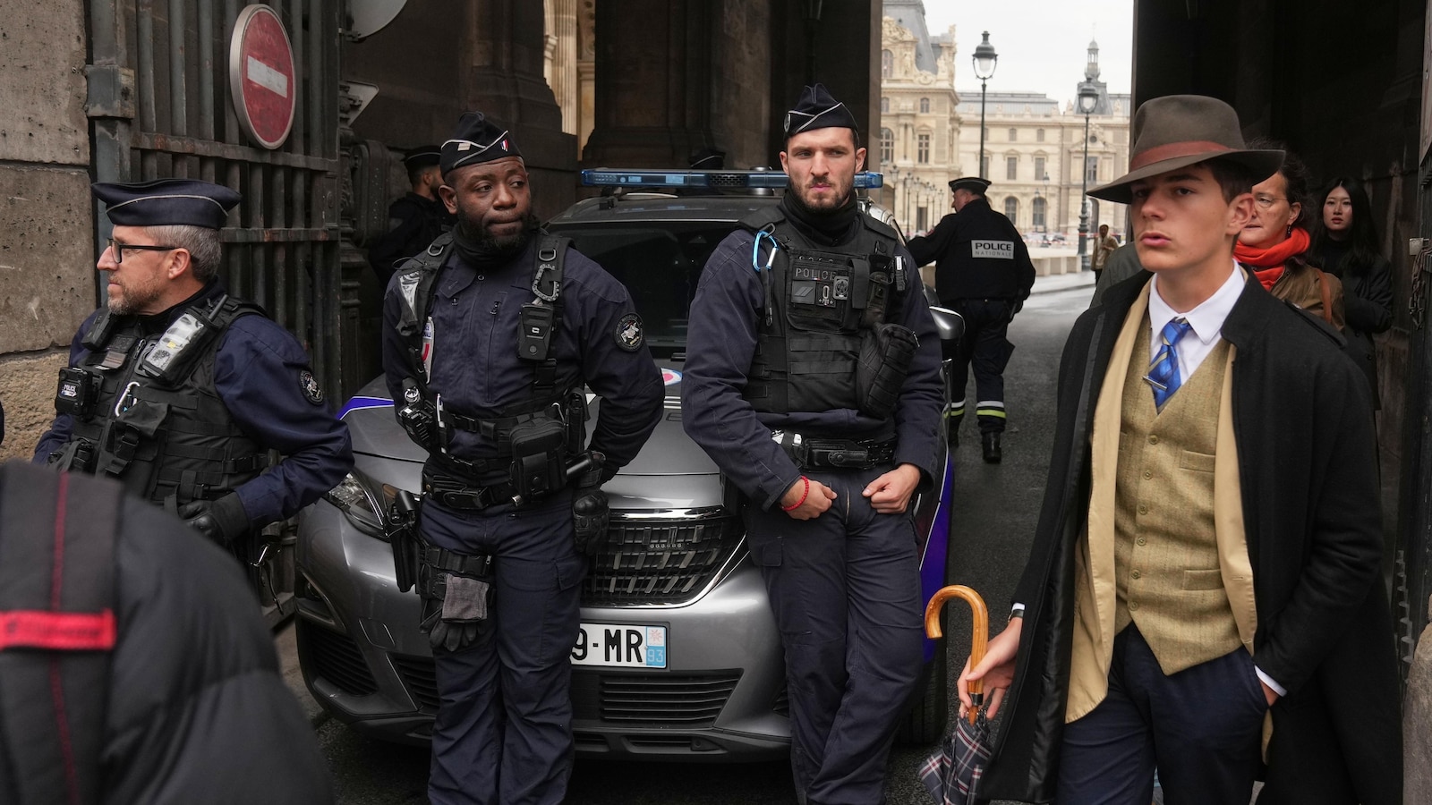 Teen behind the Louvre heist 'Fedora Man' photo embraces his mystery moment