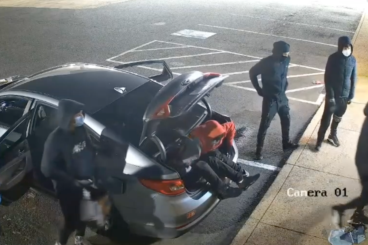 Thieves embrace their inner clowns all climbing out of the same car before heist