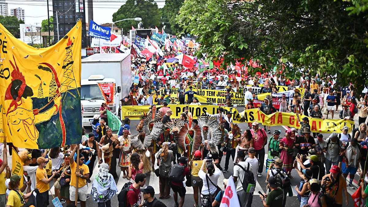 BBC World Service - Newshour, Thousands march outside COP30 summit