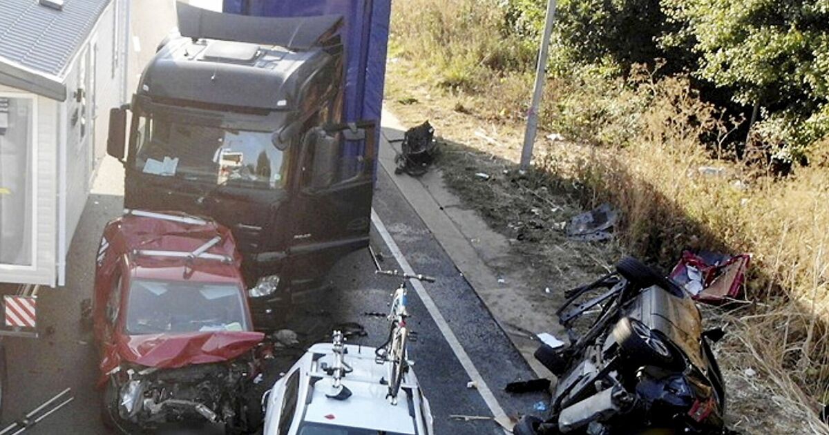 Horror moment lorry driver smashes into traffic and flips vehicle onto its roof