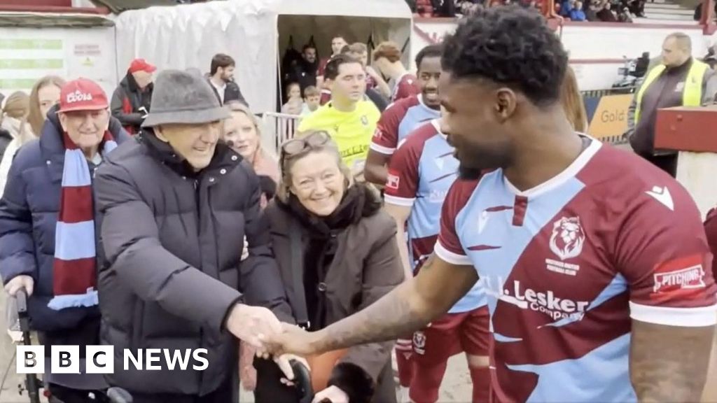 Football fan, 93, makes pitch debut as Hastings United mascot