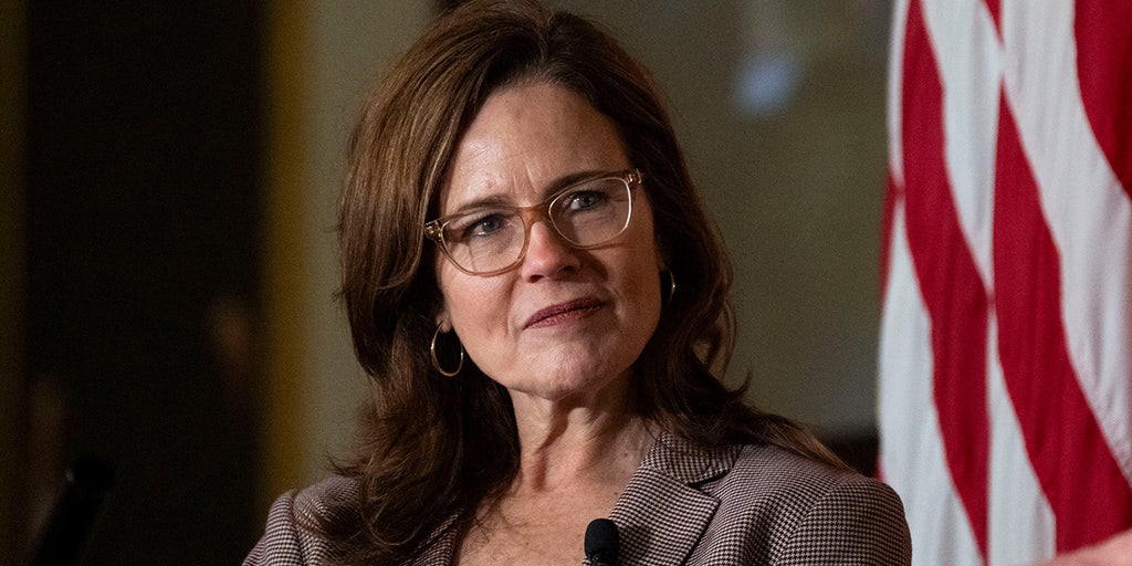 Amy Coney Barrett calls Roe v Wade 'free-floating' decision that judges 'read into' Constitution