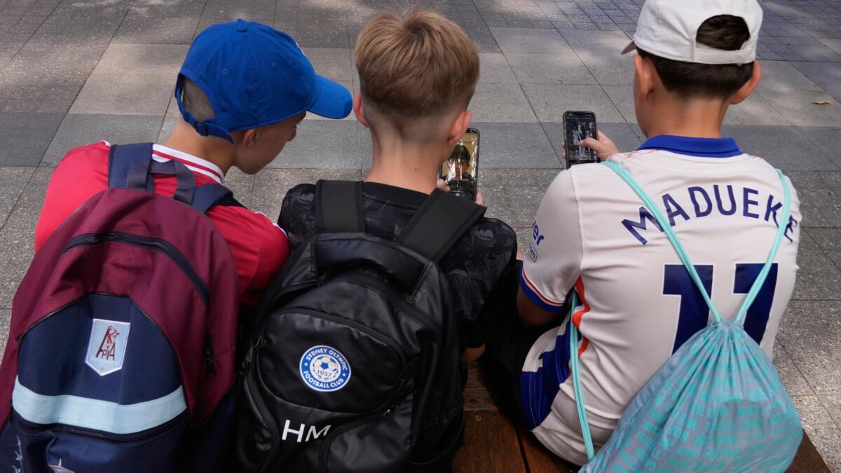 Column: Australia just banned kids from social media. Shouldn't we all?