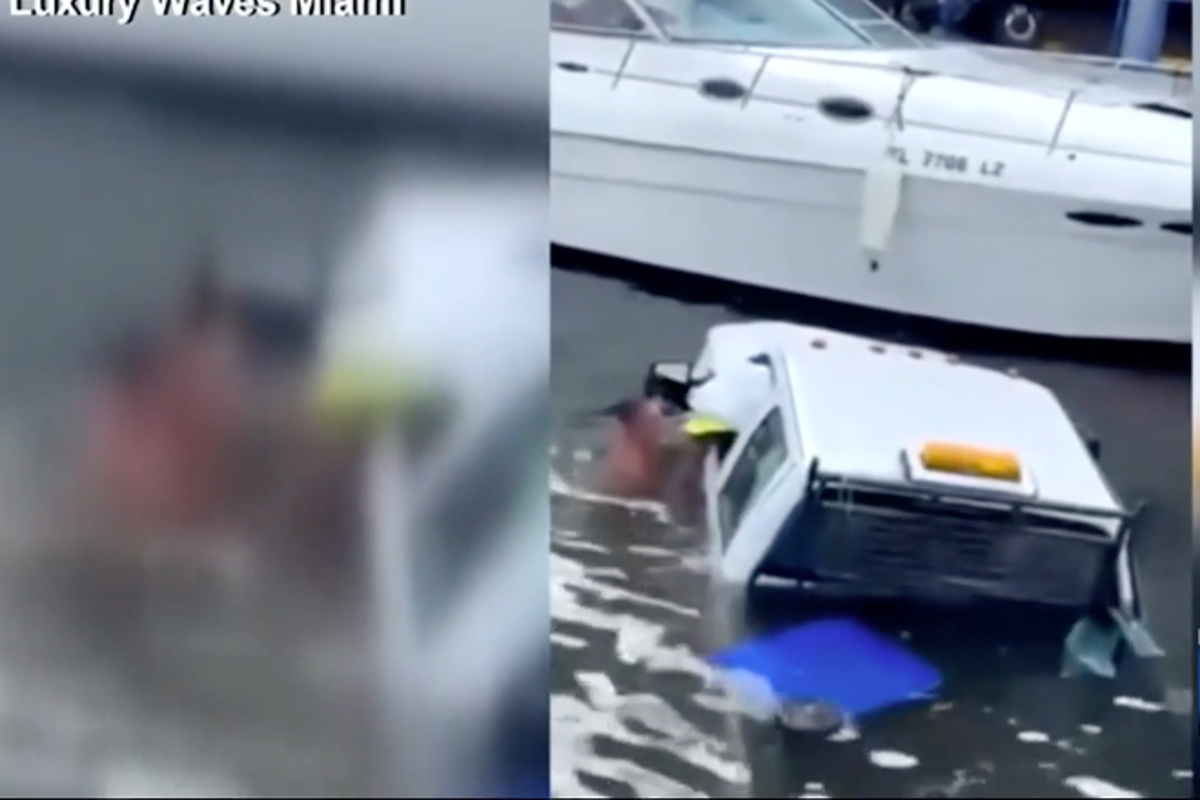 Bystanders jump in Miami River, save people trapped in sinking truck