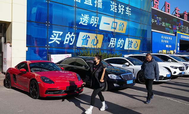 High-end car sales sink in China as its economy slows, taking a...
