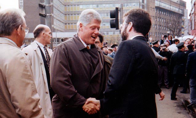 Bill Clinton shaking hands with Gerry Adams opposed by White House