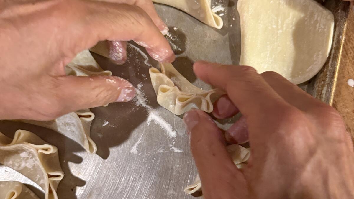 Forget presents. Wrap these dumplings for the holidays instead