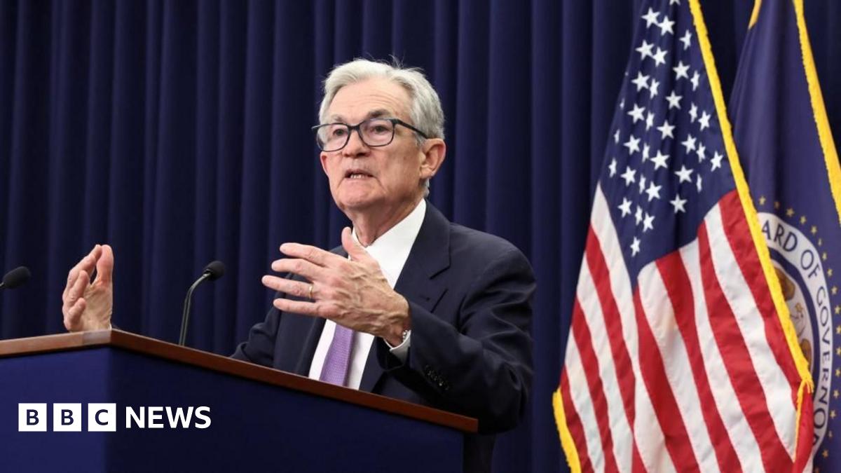 Live updates: US central bank cuts key lending rate by a quarter point