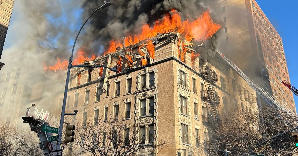 Huge fire engulfs apartment block as flames pour from building