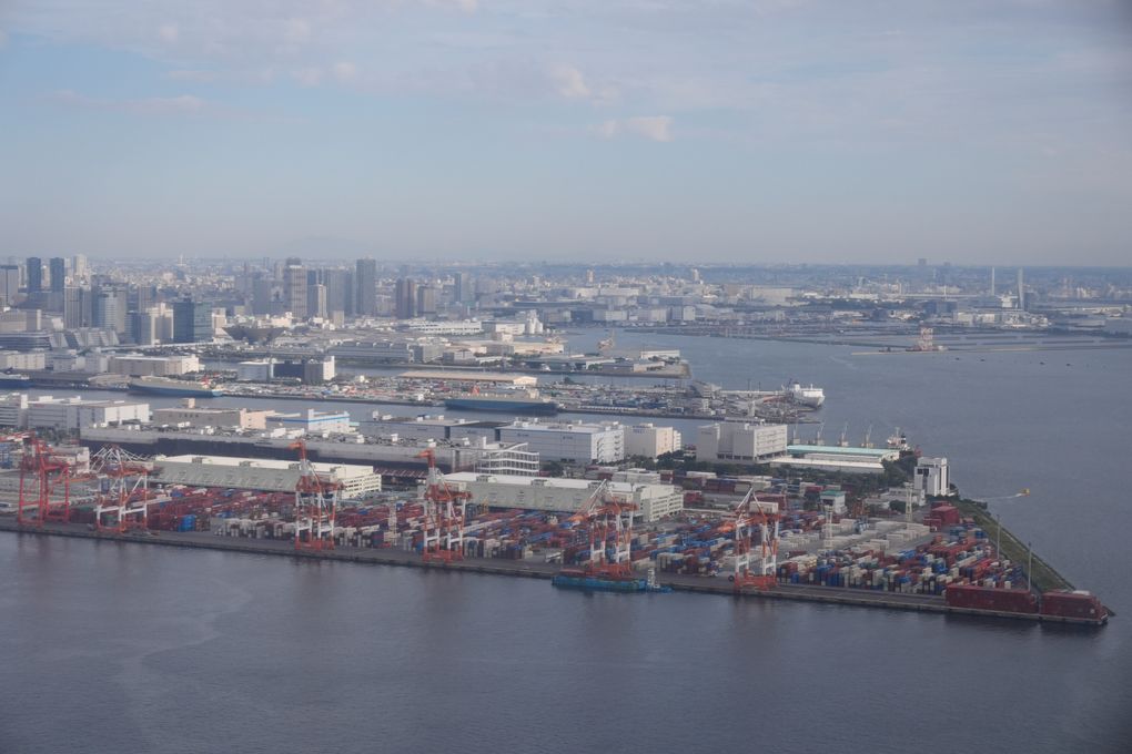 Japan revises economic data to show bigger contraction in July-September period