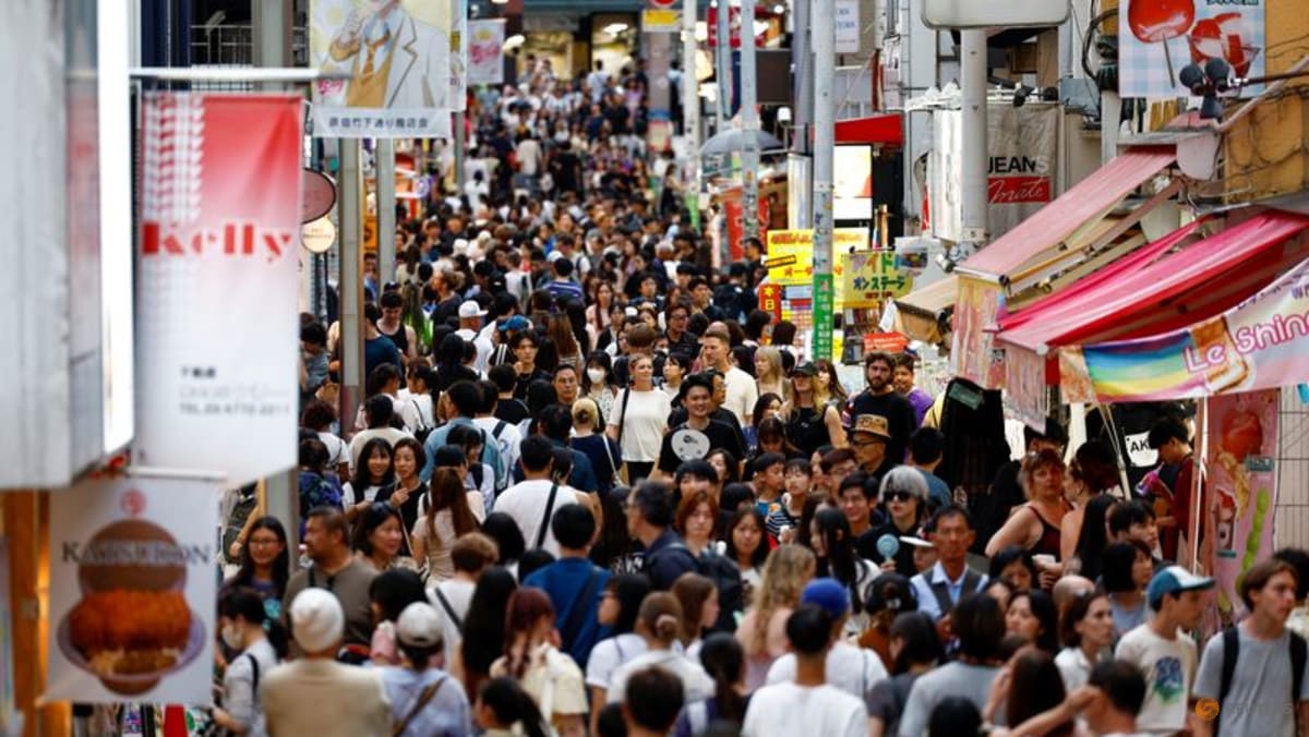 Japan proposes record budget spending while curbing fresh debt
