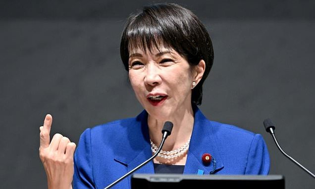 Japan govt approves record 122 trillion yen budget