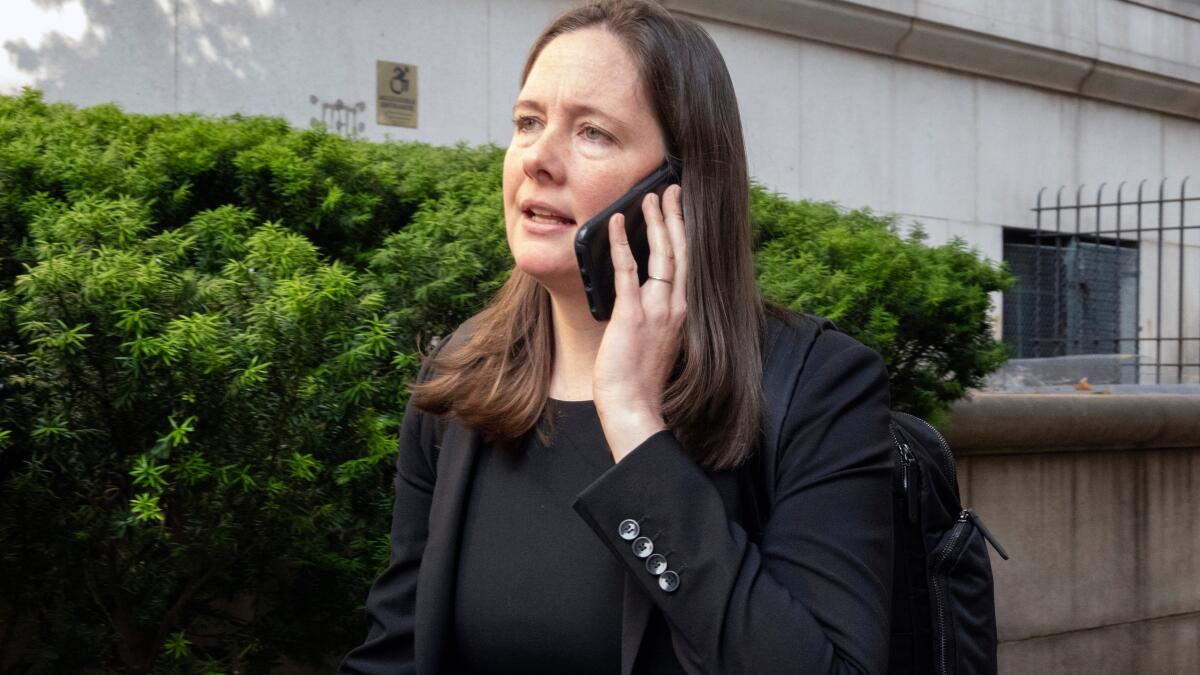 Judge to decide if ex-prosecutor Maurene Comey's wrongful termination claims belong in court