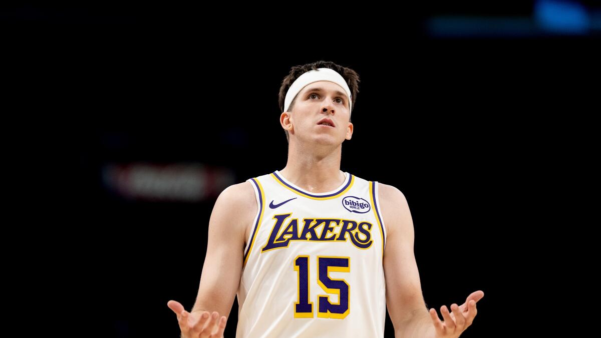 Lakers guard Austin Reaves out for at least a month because of calf injury