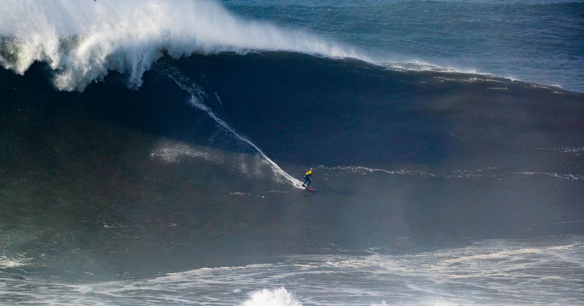 Incredible moment ex Love Island star surfs gigantic wave in world record bid - The Mirror