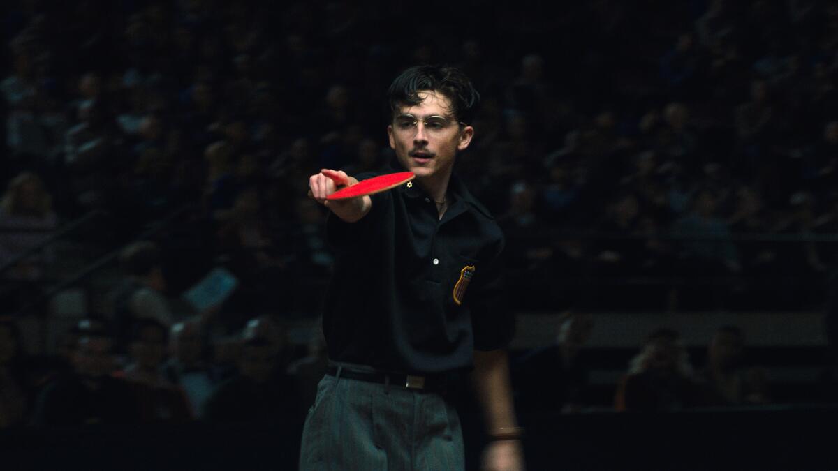 Review: 'Marty Supreme' spins ping pong into a gaspingly funny critique of the American hustle