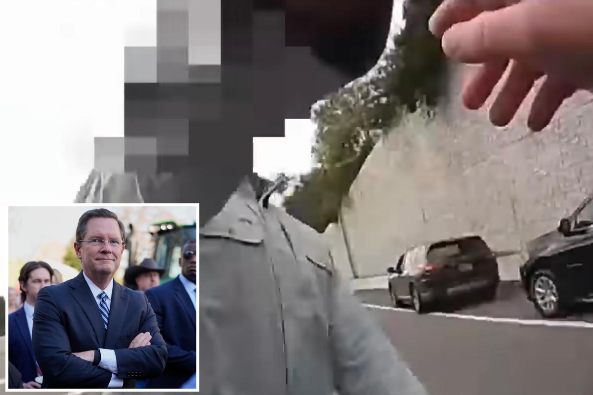 Heated bodycam footage shows cop shoving state trooper escorting...