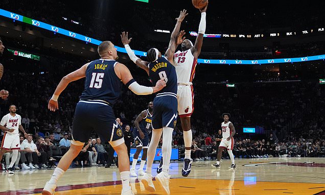 Nuggets star Nikola Jokic hurts left knee, limps off court at...