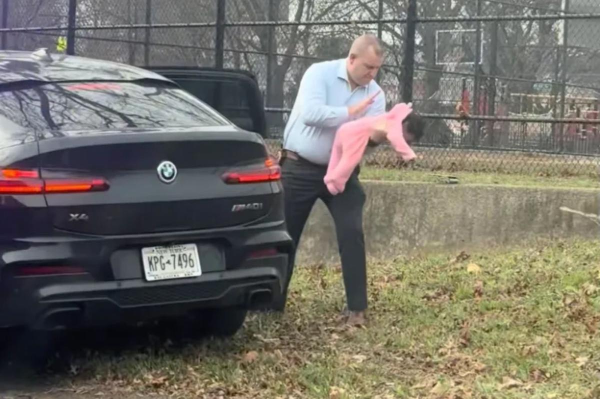 Hero NYPD cop saves choking baby on side of highway in rush-hour...