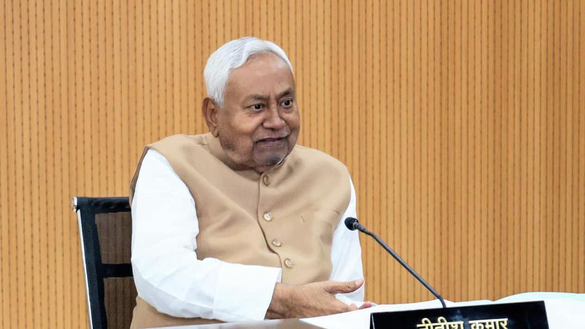 RJD slams Nitish after video shows CM removing woman's hijab