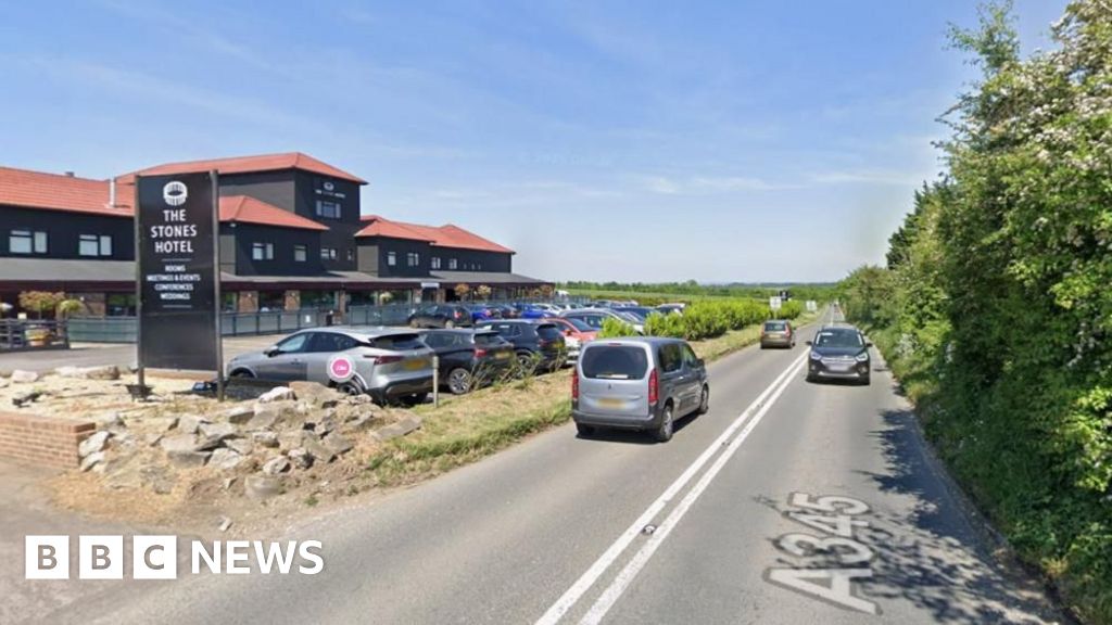 School bus crashes through hedge near Salisbury