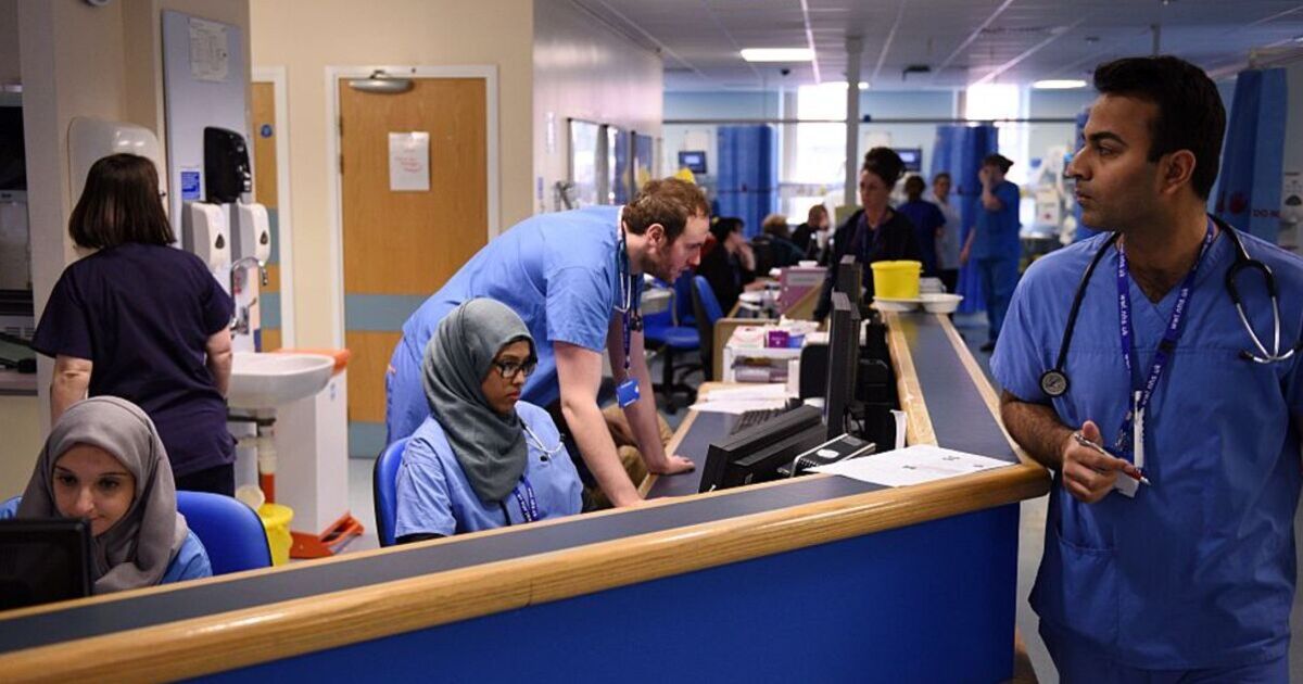 'Superflu' sweeps UK as NHS declares early crisis and experts suggest face masks