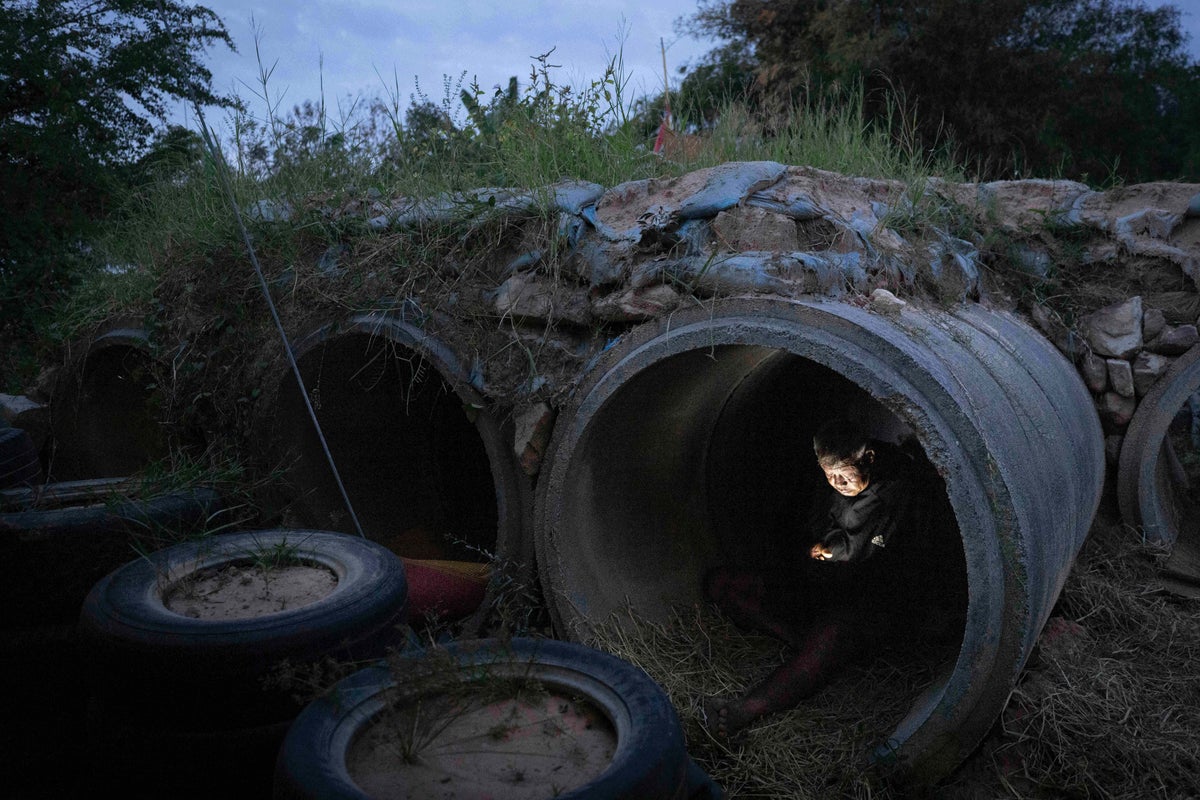 Photos show locals in Thailand and Cambodia taking shelter as border conflict intensifies