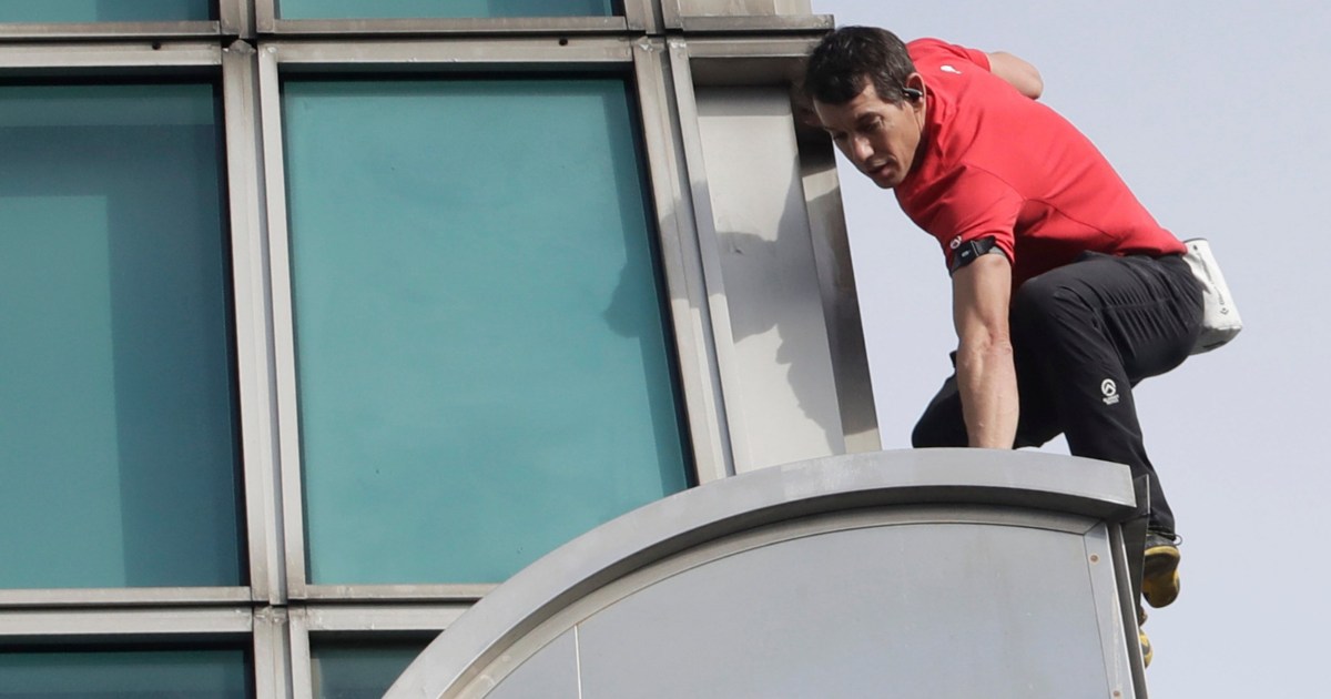 Rock climber scales Taiwan's tallest building in just 90 minutes