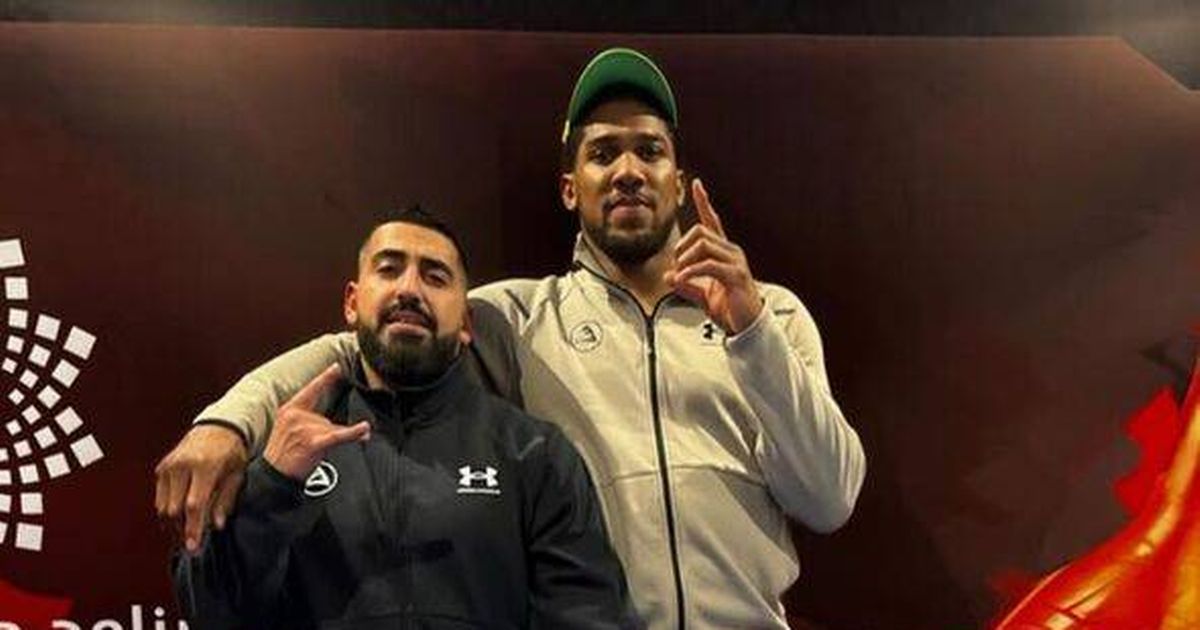 Anthony Joshua pays respects to car crash victims at funeral home after leaving hospital - Daily Star
