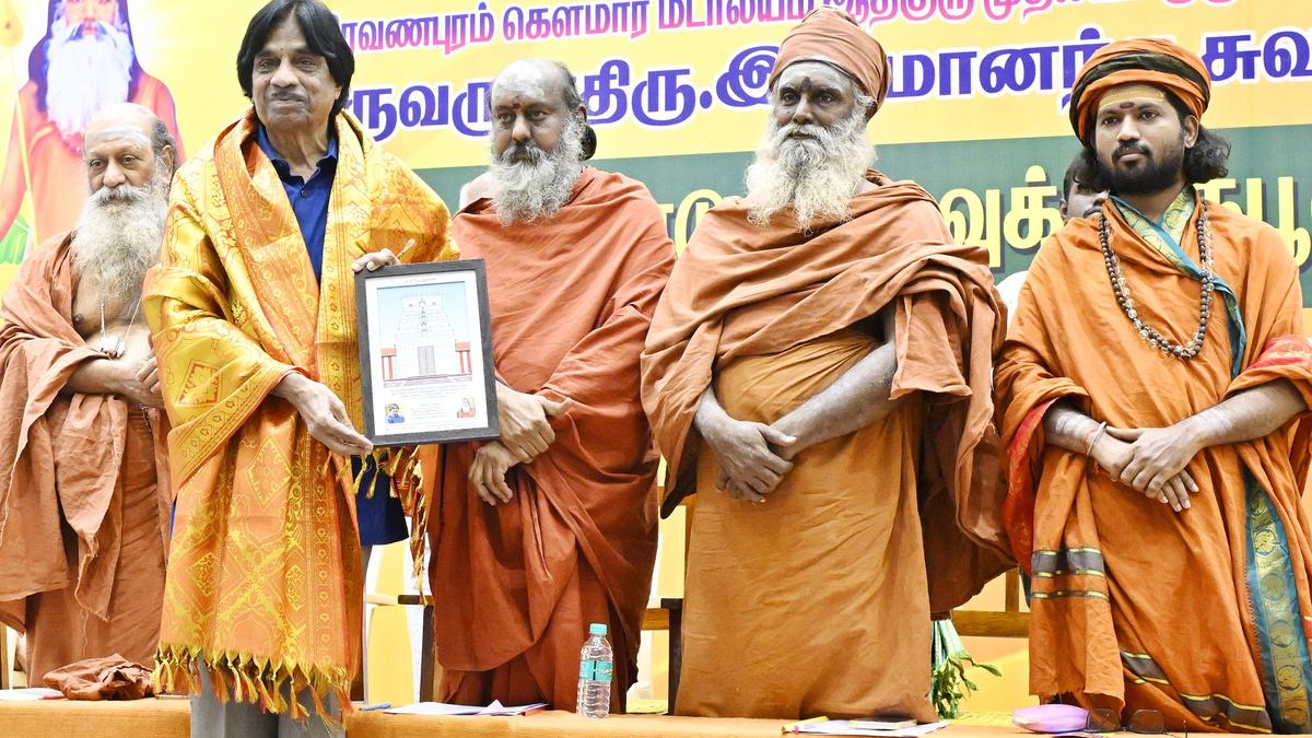 E. Balagurusamy receives the 'Benevolent Academician' award from Siravai Adheenam