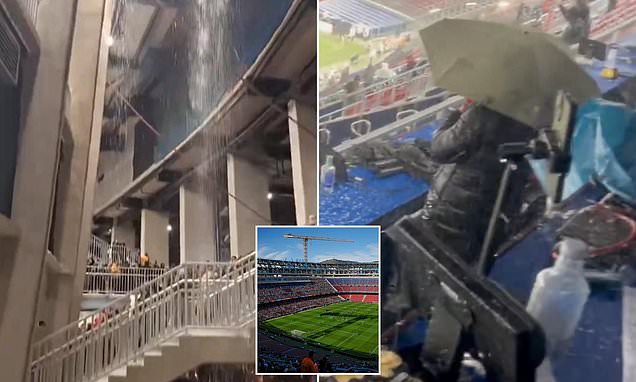 Barcelona's newly-renovated Nou Camp is FLOODED by heavy rain