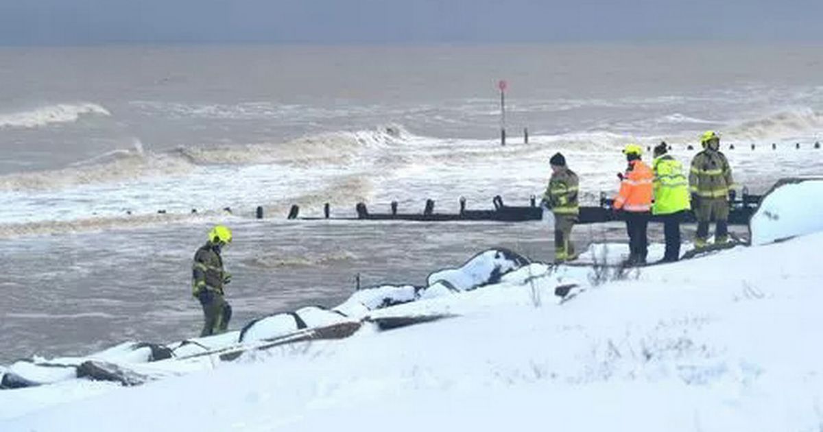 CCTV shows girl 'knocked into sea' by huge wave as two dead after rescue attempt