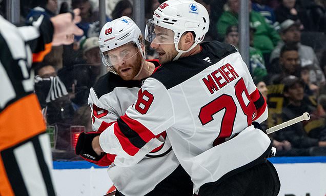 Cody Glass has 2 goals and an assist in Devils' 5-4 win over Canucks