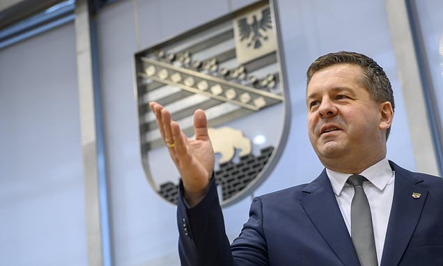 Lawmakers in German state elect new governor to counter far-right rise