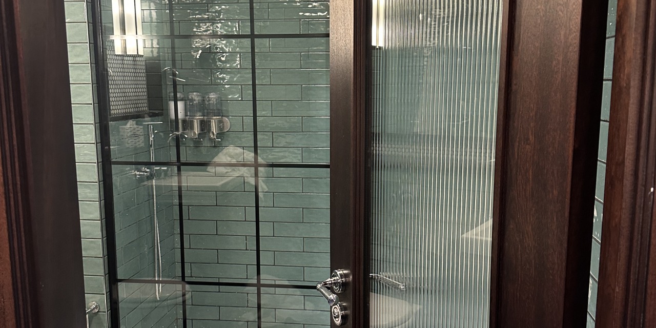 Hotels are Getting Rid of Proper Bathroom Doors and Guests are Revolting