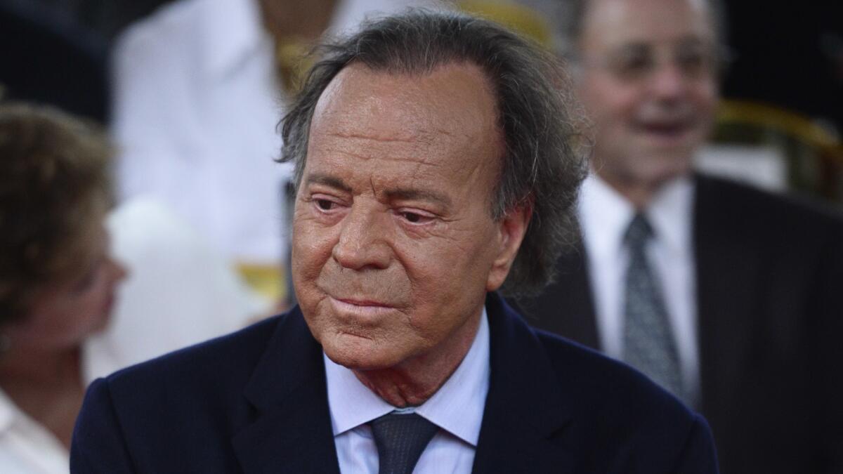 Julio Iglesias denies 'absolutely false' allegations that he sexually abused former employees